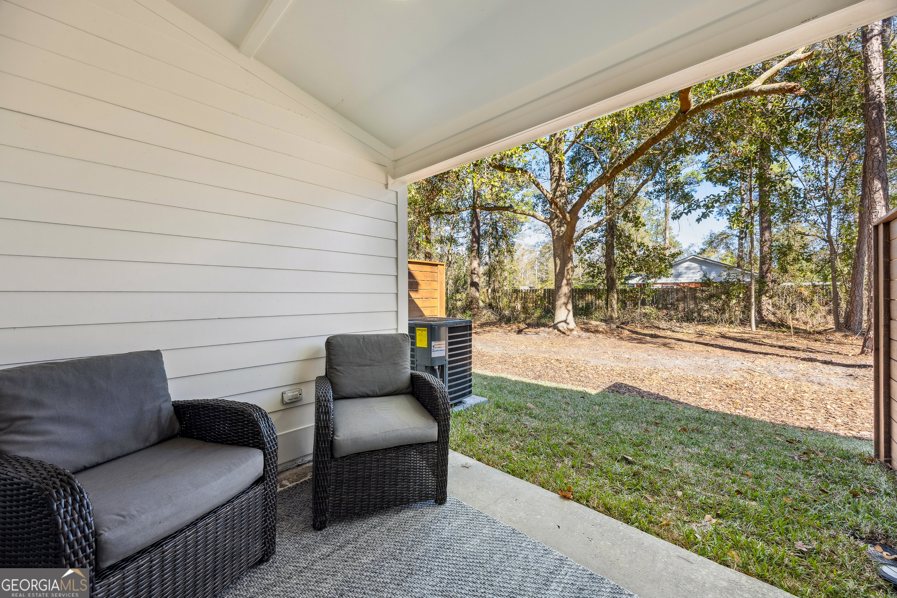 182 Clarks Bluff Road Kingsland, GA 31548 - Photo 24 of 27 a view of yard with outdoor seating