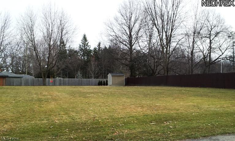 399 South Miller Road Akron, OH 44333 - Photo 20 of 20 3/4 quarters of an acre. Storage shed remains with the property. Level back yard offering plenty of possibilities.