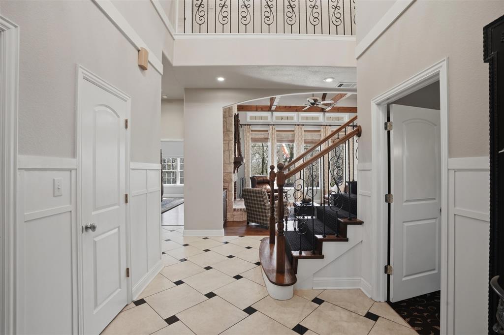 9651 Yellow Rose Lane Pilot Point, TX 76258 - Photo 6 of 38 a view of a hallway with living room and furniture