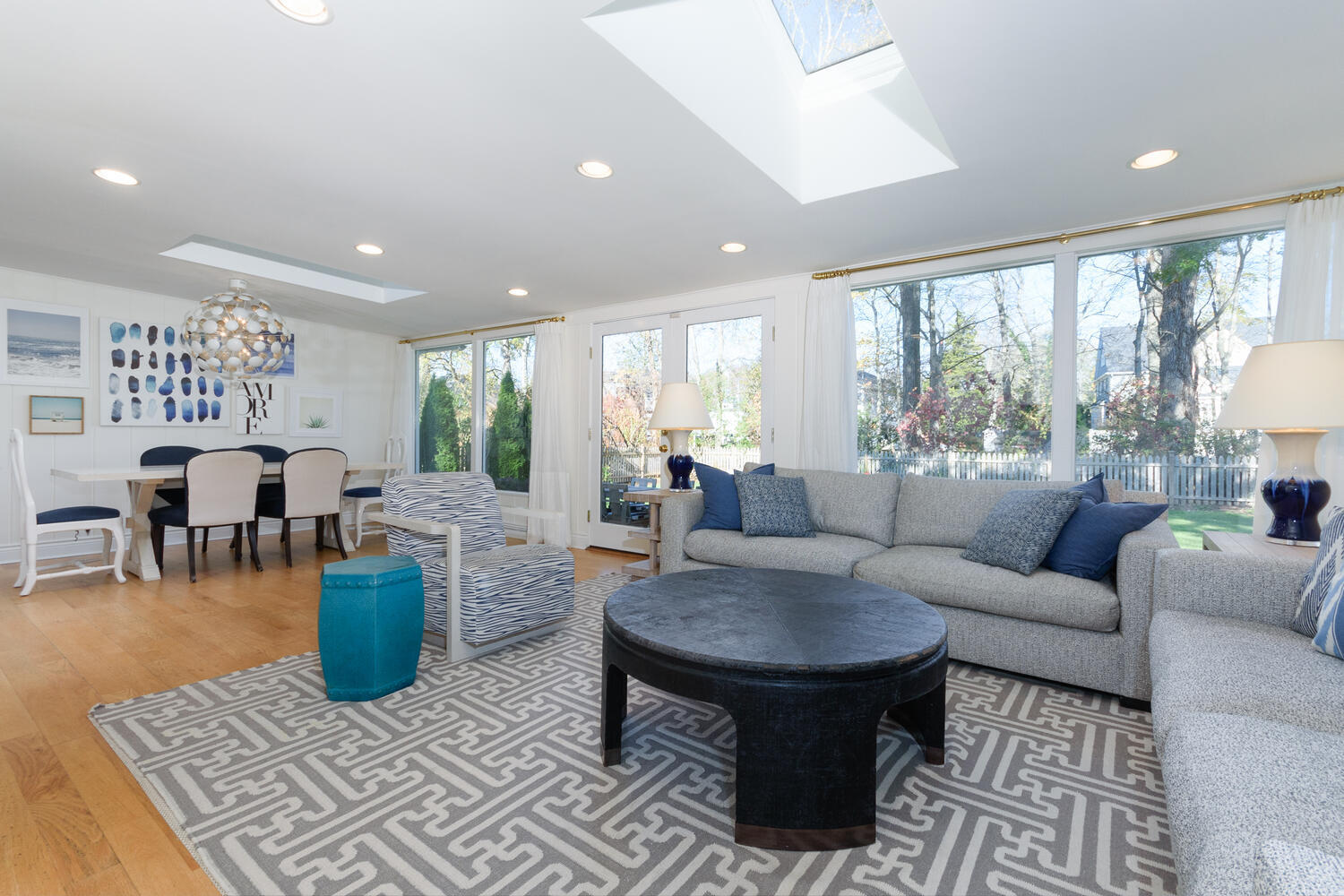 19 Laforge Road Darien, CT 06820 - Photo 11 of 33 a living room with furniture a rug and a large window