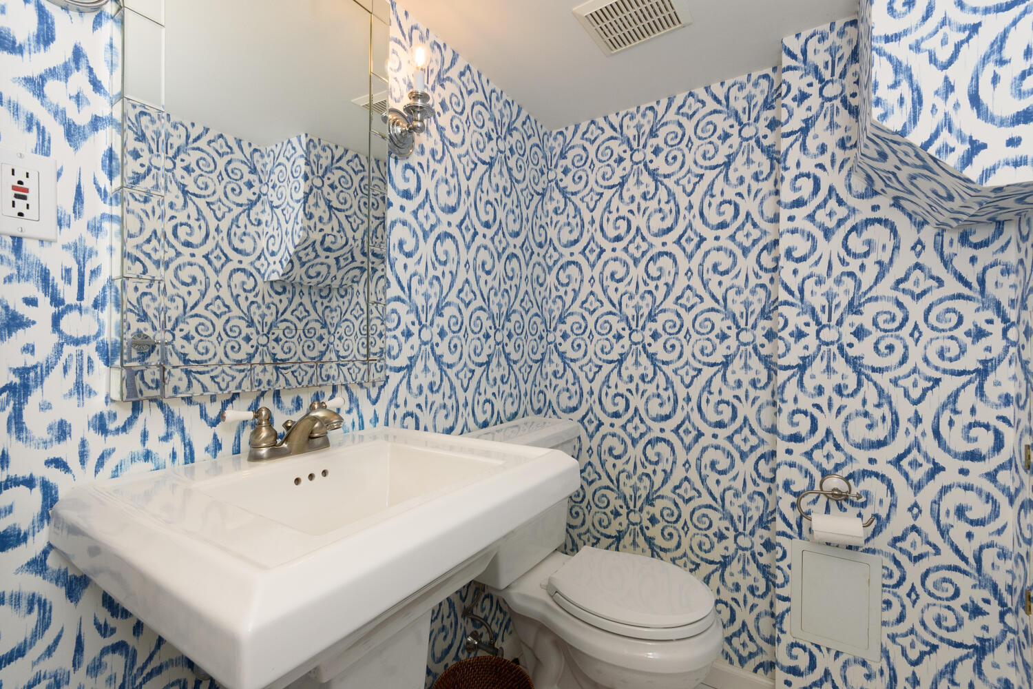 19 Laforge Road Darien, CT 06820 - Photo 14 of 33 a bathroom with a sink a toilet and a mirror
