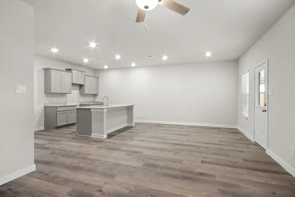 a view of kitchen with wooden floor
