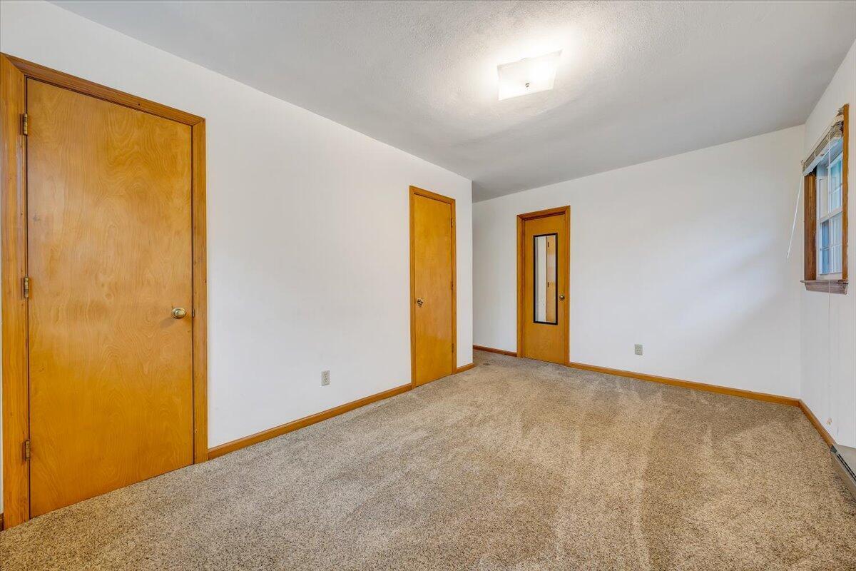 570 Scuffling Hill Road Rocky Mount, VA 24151 - Photo 20 of 35 a view of an empty room with a window