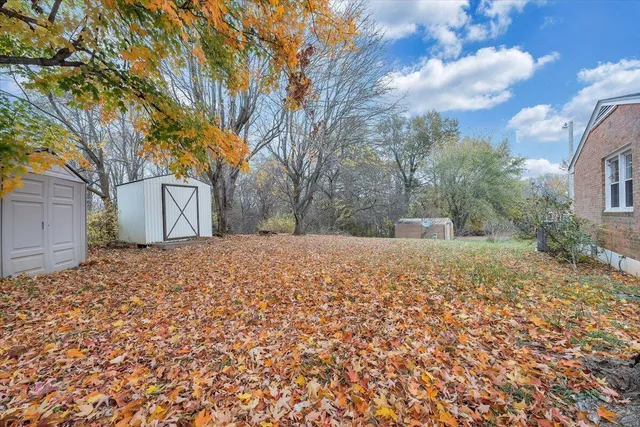 a house with trees in front of it