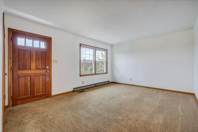 an empty room with windows