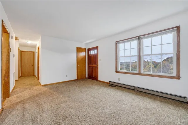 an empty room with windows