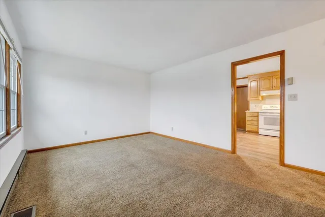 an empty room with window