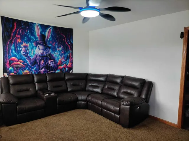 a living room with furniture and a couch
