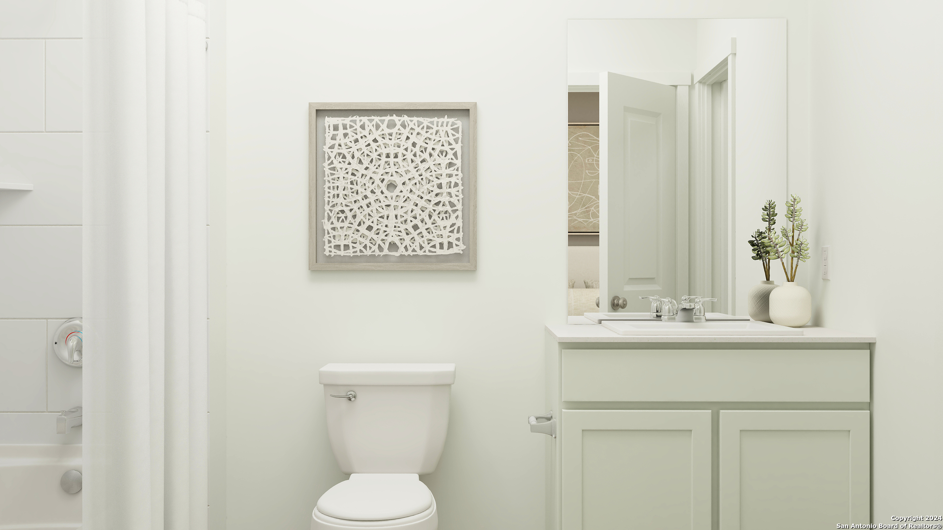 10622 Marlin Pond Road San Antonio, TX 78224 - Photo 4 of 33 a bathroom with a toilet sink and mirror