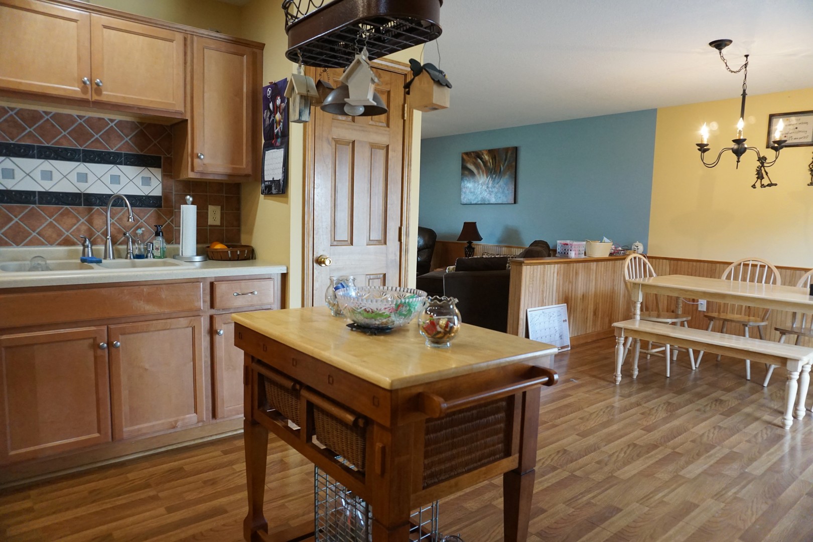 220 High Street Weldon, IL 61882 - Photo 14 of 33 a view of a dining room with furniture and wooden floor