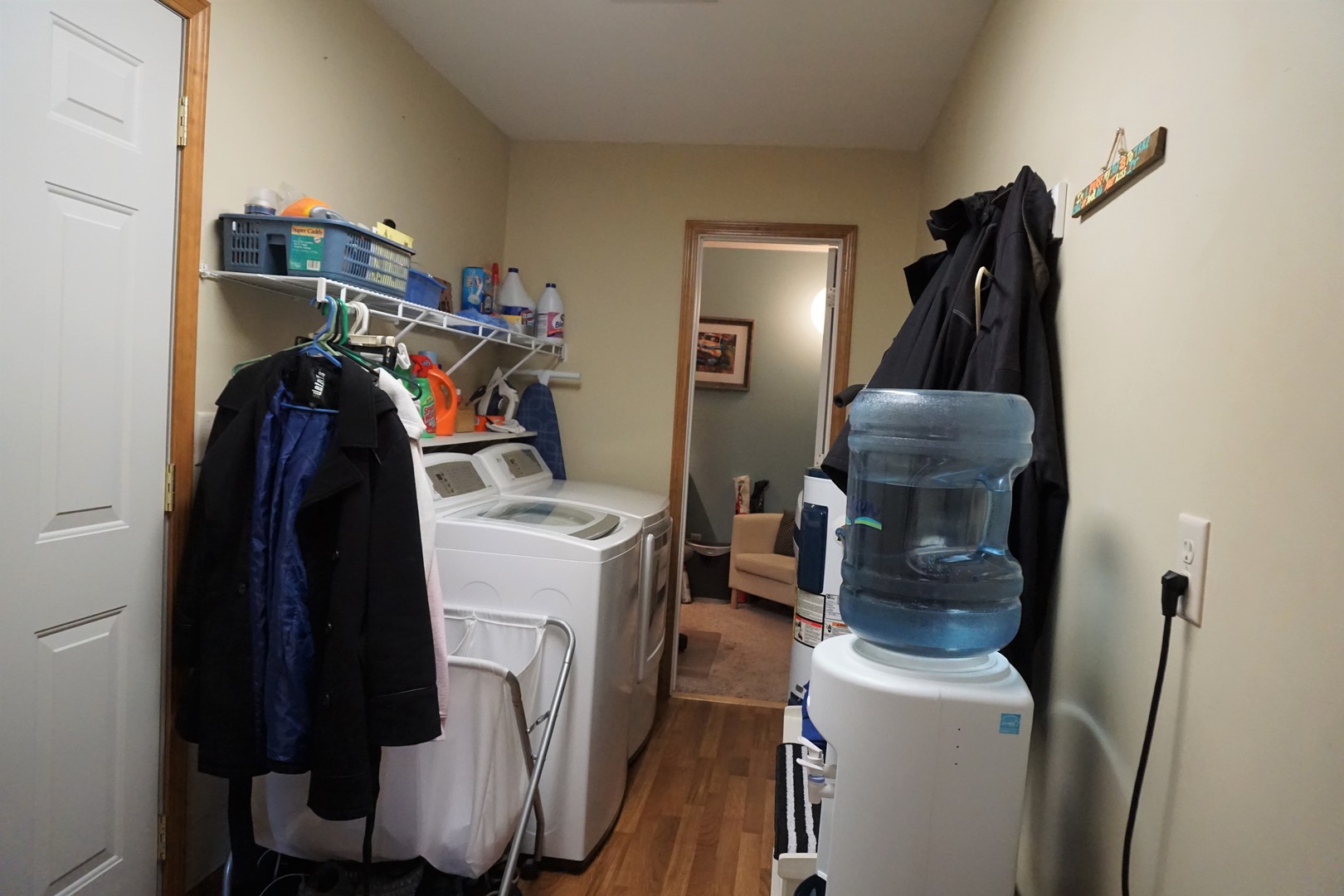 220 High Street Weldon, IL 61882 - Photo 17 of 33 a view of walk in closet with clothes and shoes
