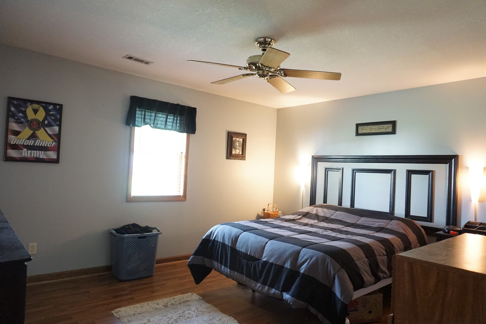 220 High Street Weldon, IL 61882 - Photo 19 of 33 a bedroom with a large bed and a window