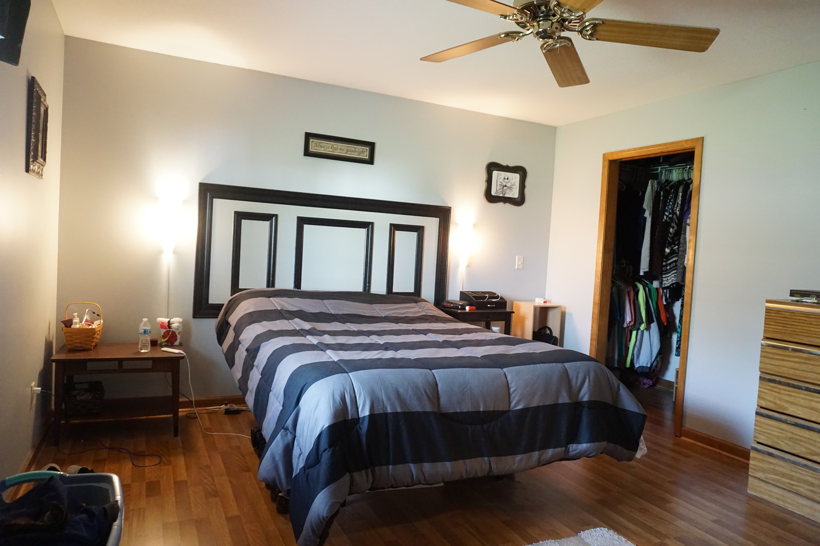 220 High Street Weldon, IL 61882 - Photo 20 of 33 a bedroom with a bed and a chandelier