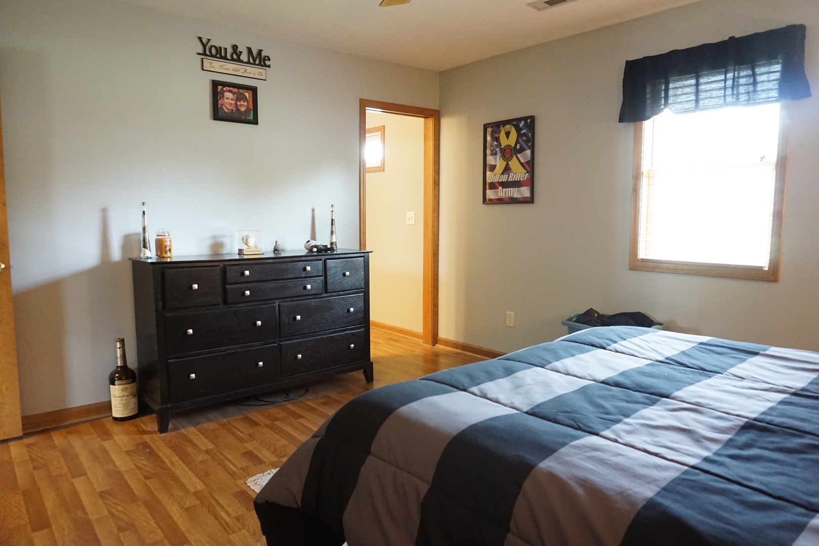 220 High Street Weldon, IL 61882 - Photo 21 of 33 a bedroom with a bed and a window