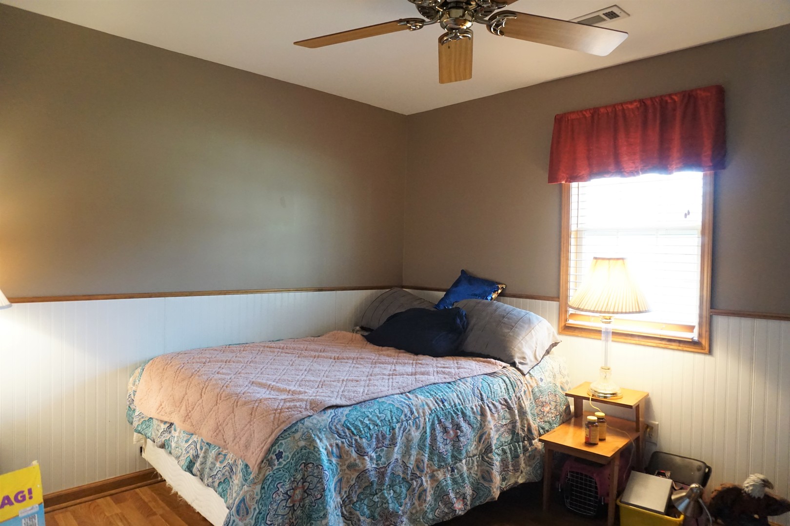 220 High Street Weldon, IL 61882 - Photo 25 of 33 a bedroom with a bed and window