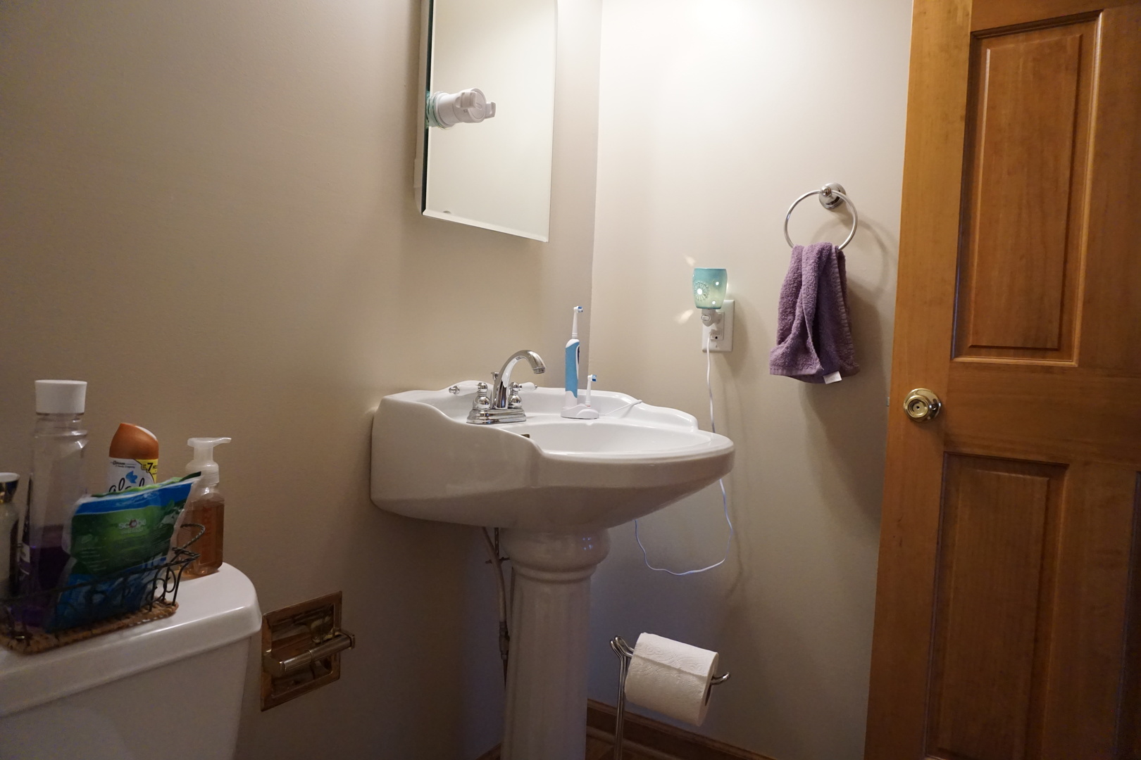 220 High Street Weldon, IL 61882 - Photo 31 of 33 a bathroom with a sink toilet and mirror