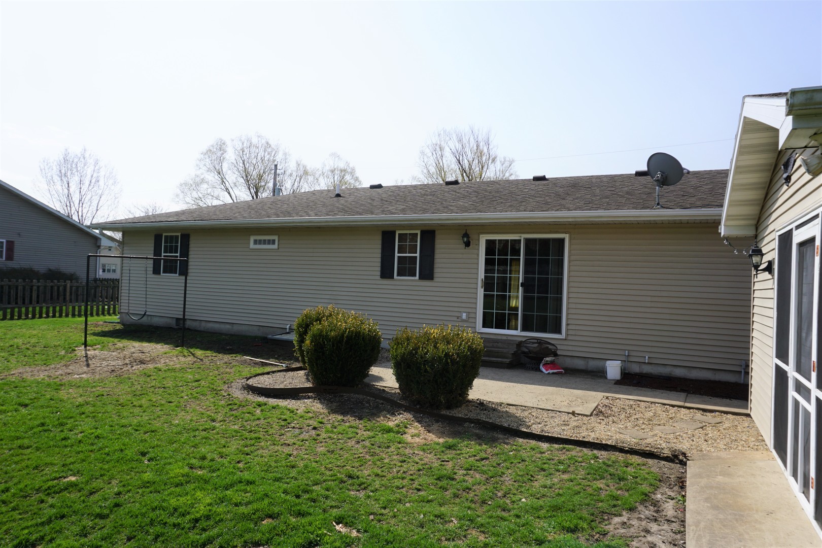 220 High Street Weldon, IL 61882 - Photo 6 of 33 a front view of a house with a garden