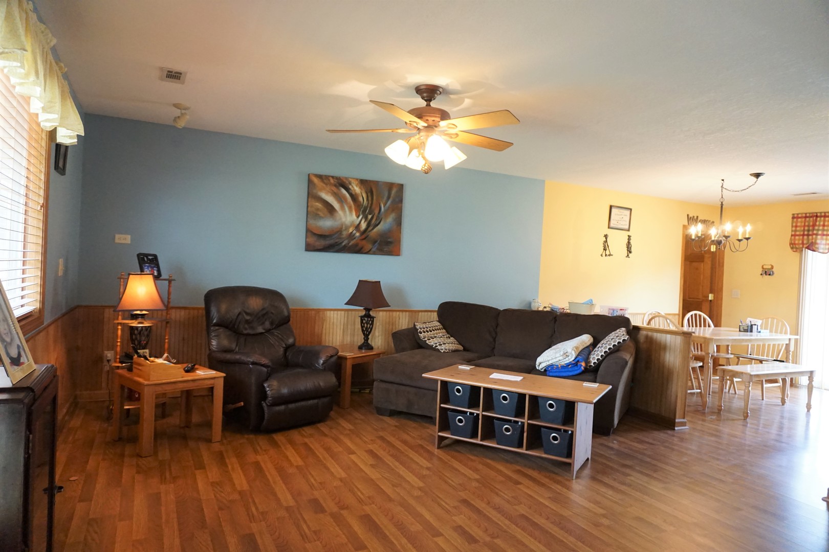 220 High Street Weldon, IL 61882 - Photo 8 of 33 a living room with furniture and wooden floor