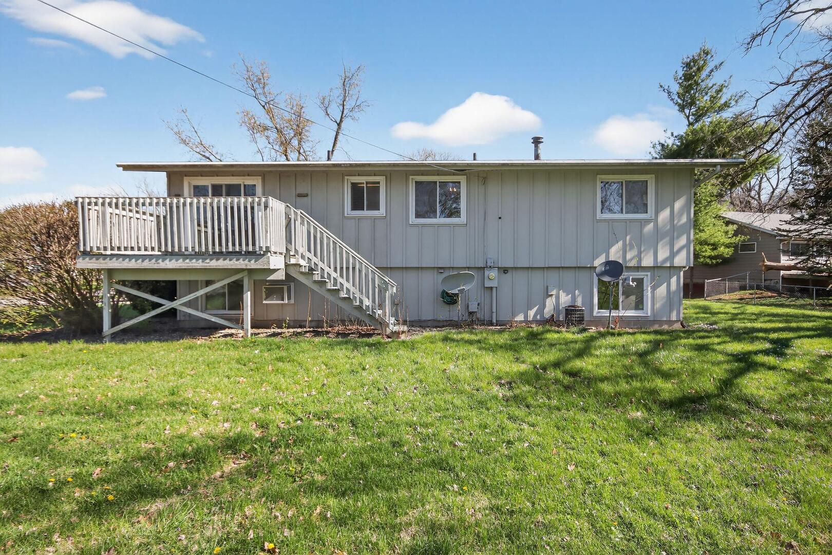 a house view with a garden space