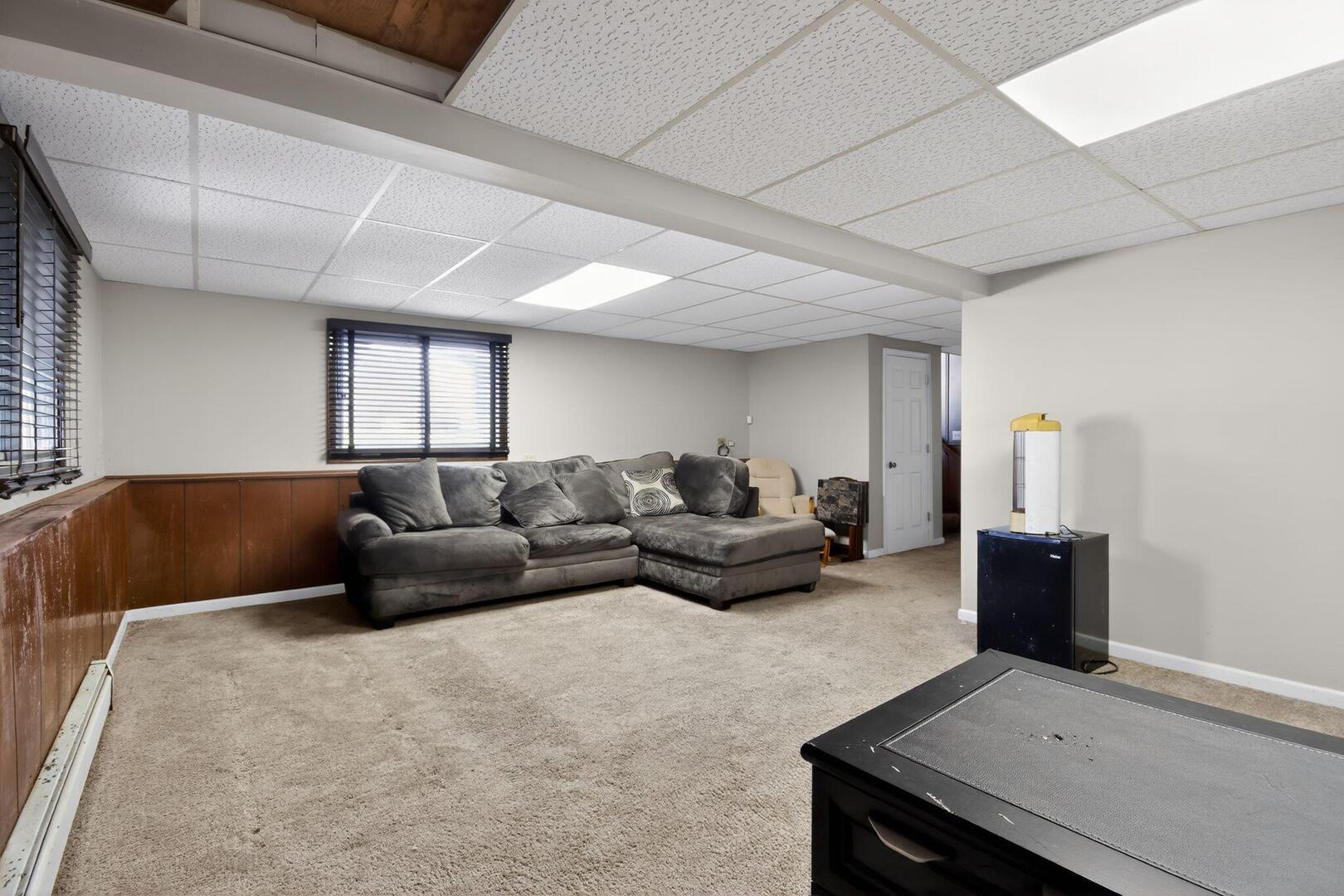 3552 North Water Street Decatur, IL 62526 - Photo 11 of 30 a living room with furniture and a couch