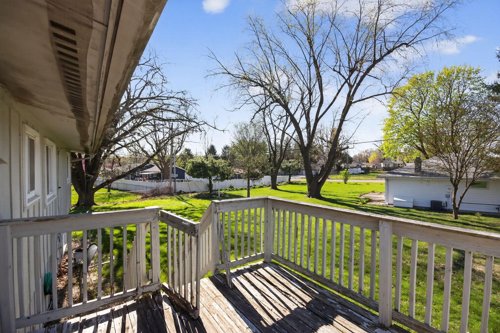 3552 North Water Street Decatur, IL 62526 - Photo 2 of 30 a view of street with wooden deck and trees