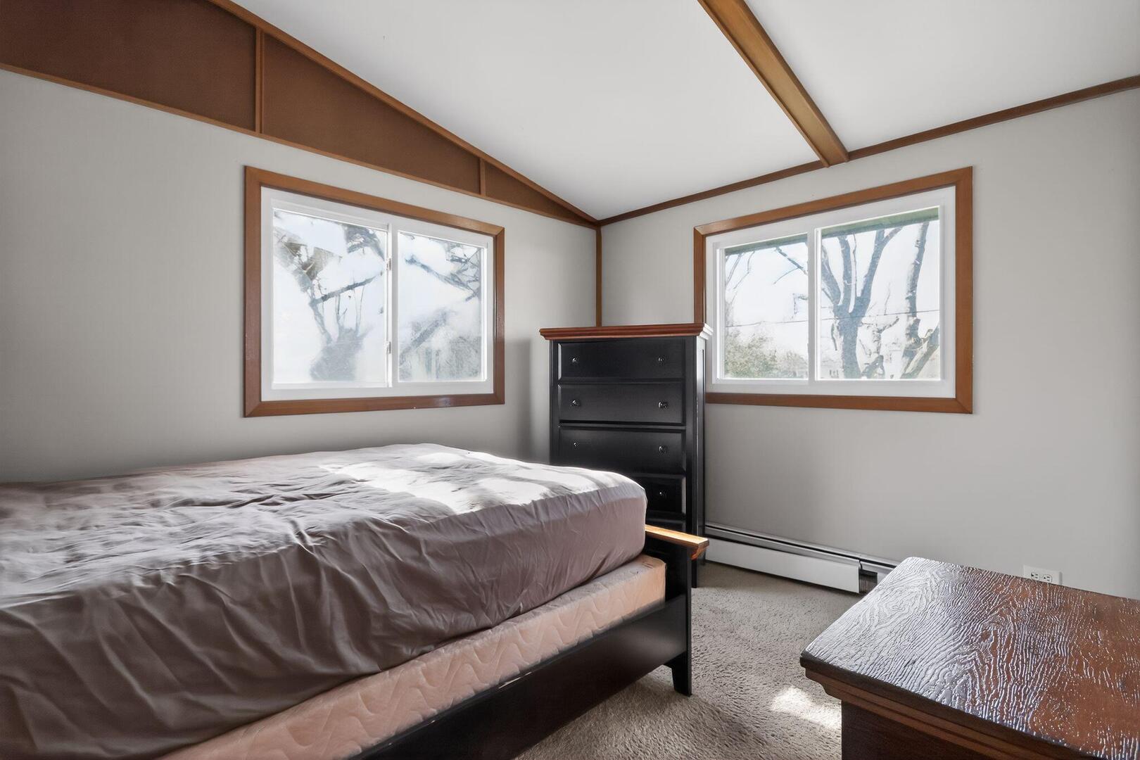 3552 North Water Street Decatur, IL 62526 - Photo 25 of 30 a bedroom with a bed and a window