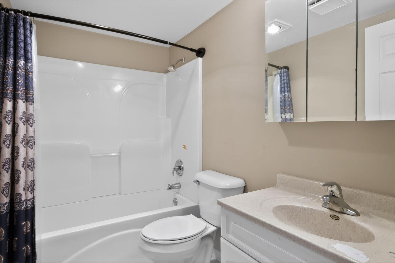 3552 North Water Street Decatur, IL 62526 - Photo 26 of 30 a bathroom with a sink toilet and shower