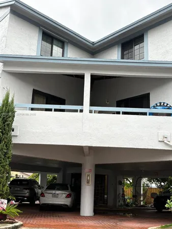 a car parked in front of a building