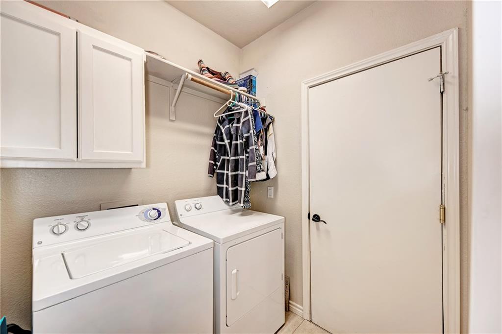 1813 White Oak Loop Round Rock, TX 78681 - Photo 19 of 30 a utility room with dryer and washer