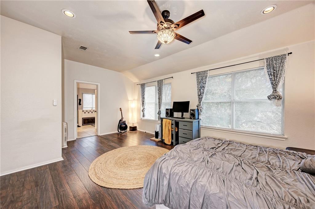 1813 White Oak Loop Round Rock, TX 78681 - Photo 23 of 30 a bedroom with furniture and a window