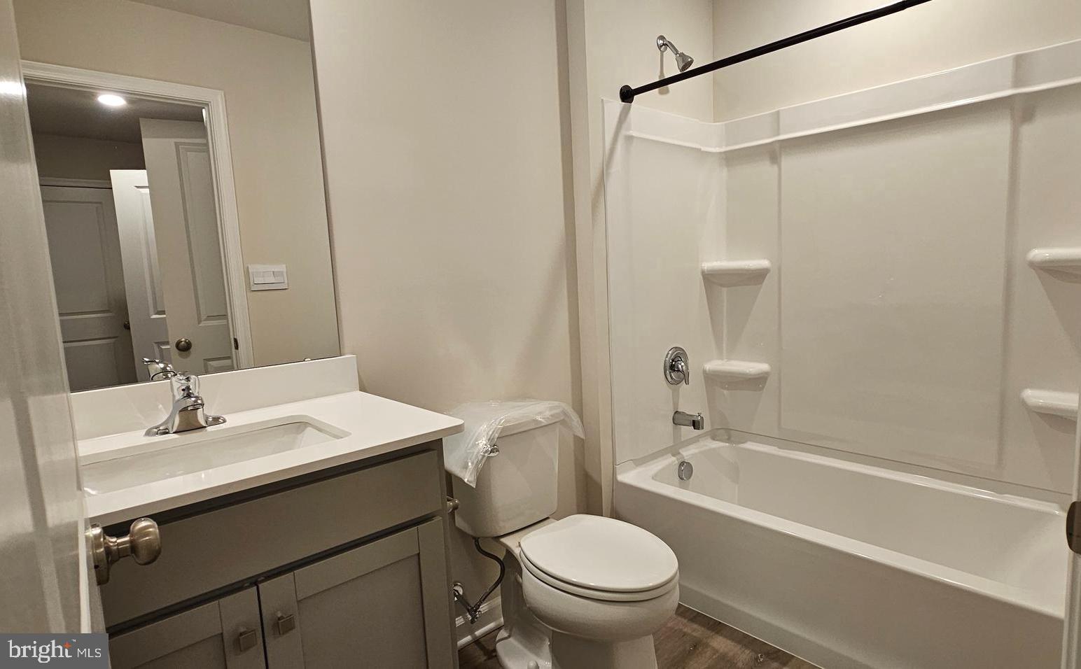 1151 Martin Road Breinigsville, PA 18031 - Photo 15 of 17 a bathroom with a sink toilet and shower