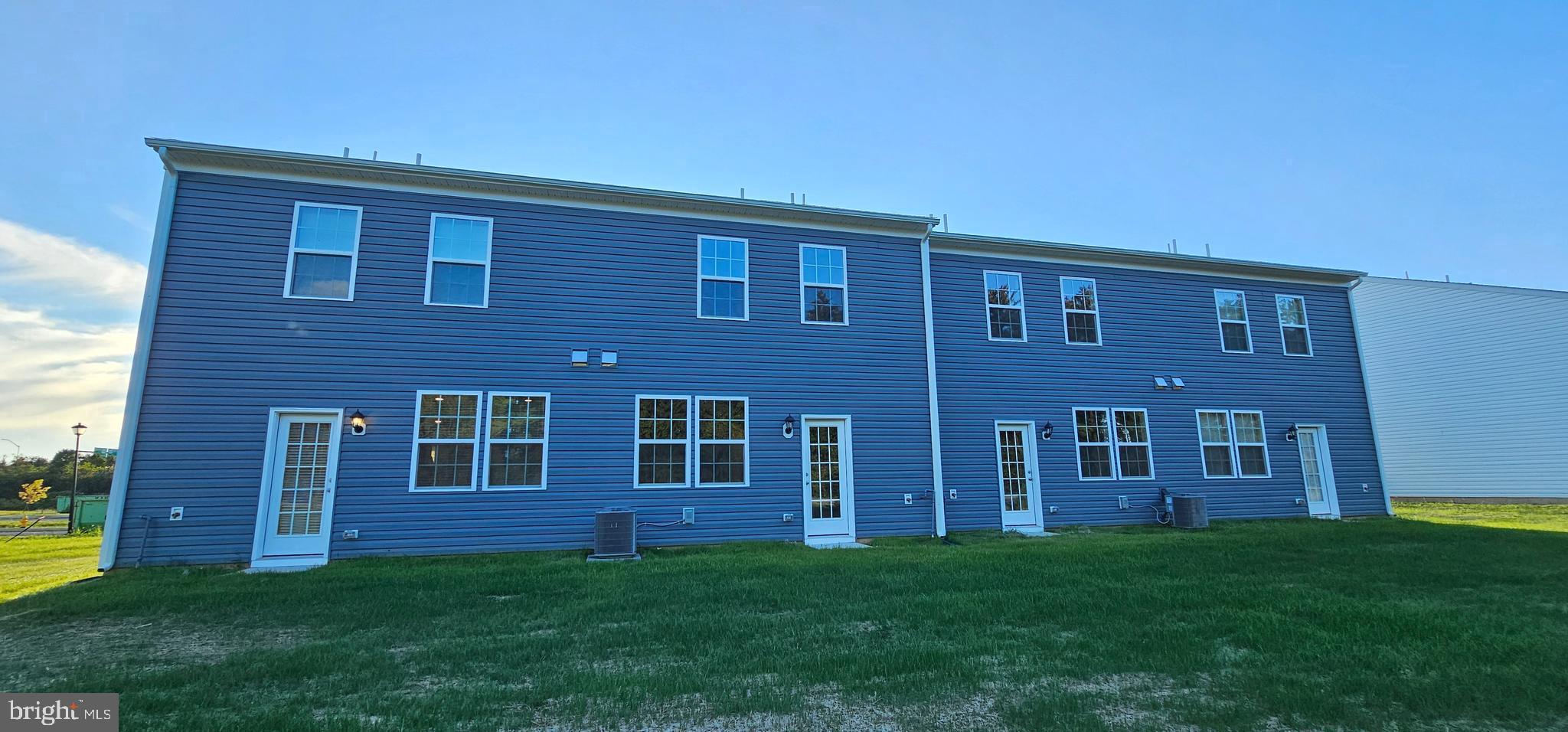 1151 Martin Road Breinigsville, PA 18031 - Photo 17 of 17 a view of a brick house with a yard