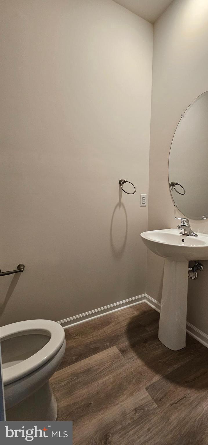 1151 Martin Road Breinigsville, PA 18031 - Photo 10 of 17 a bathroom with a toilet and a sink