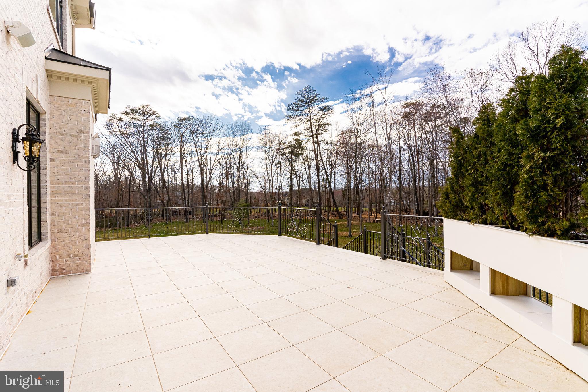 11345 Albermyrtle Road Potomac, MD 20854 - Photo 14 of 53 Sweeping Main Level Terrace