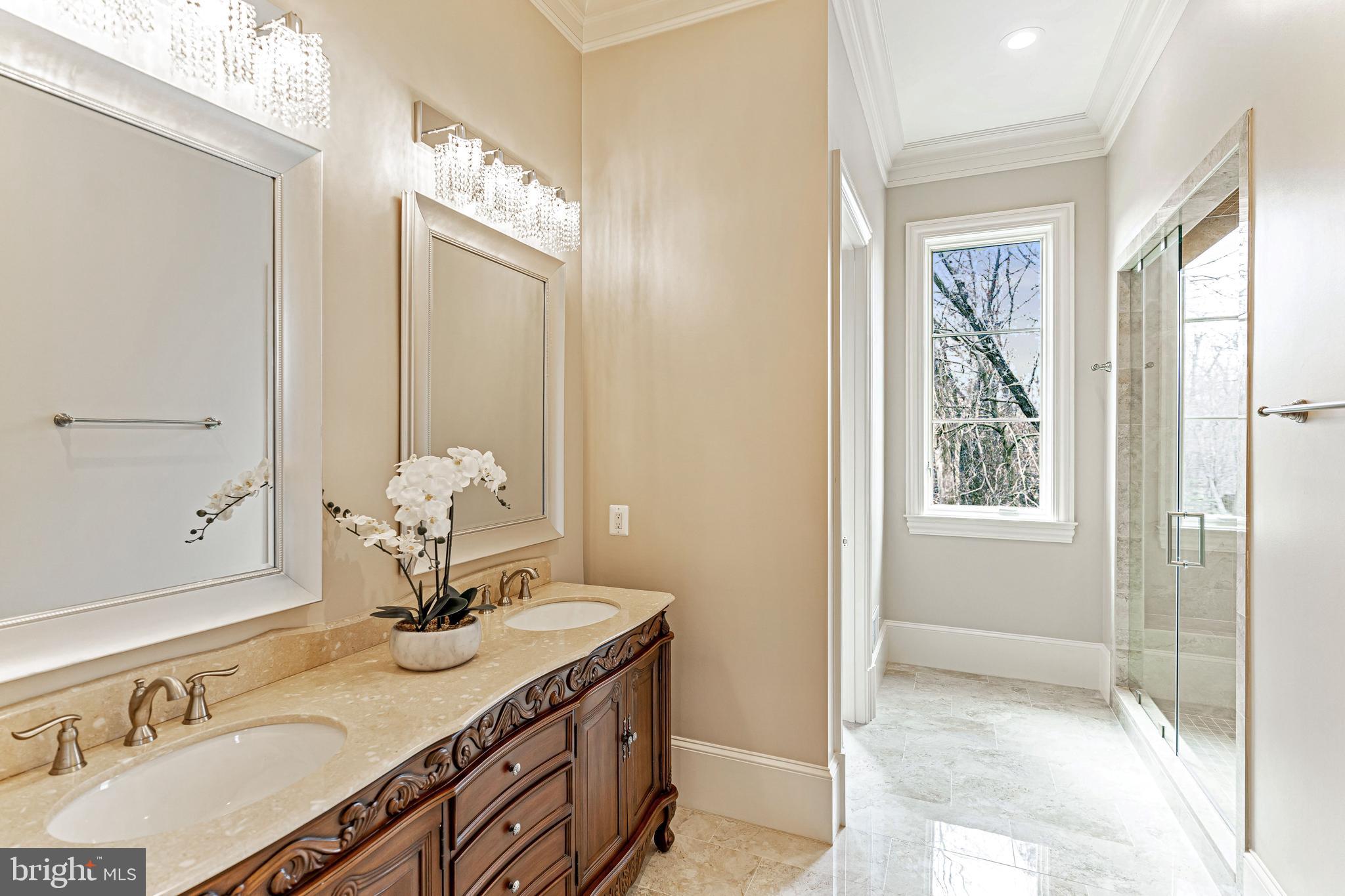 11345 Albermyrtle Road Potomac, MD 20854 - Photo 19 of 53 Guest Suite Bath w/Crema Marfil Marble