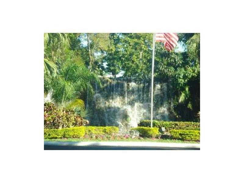16251 Golf Club Road, Unit 210 Weston, FL 33326 - Photo 2 of 28 a picture of a yard