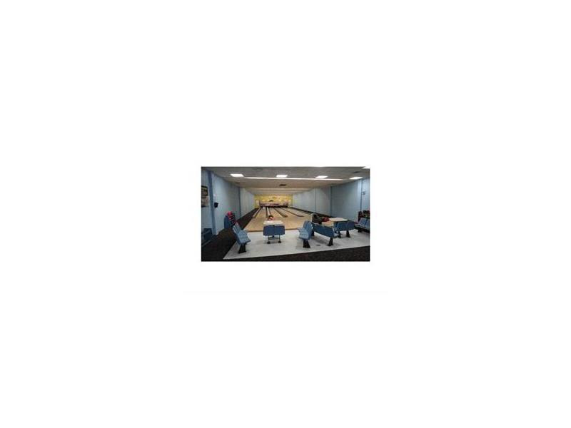16251 Golf Club Road, Unit 210 Weston, FL 33326 - Photo 22 of 28 a picture of a room that has a couch