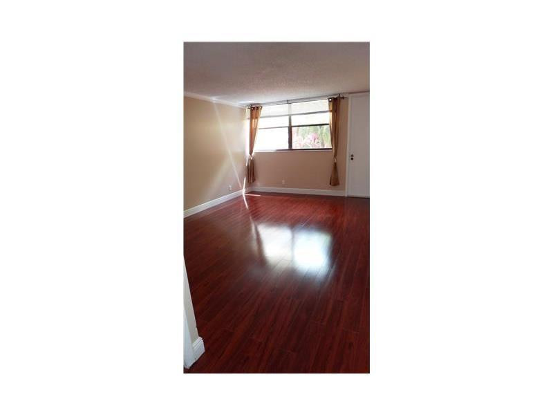 16251 Golf Club Road, Unit 210 Weston, FL 33326 - Photo 28 of 28 a view of a living room with a window