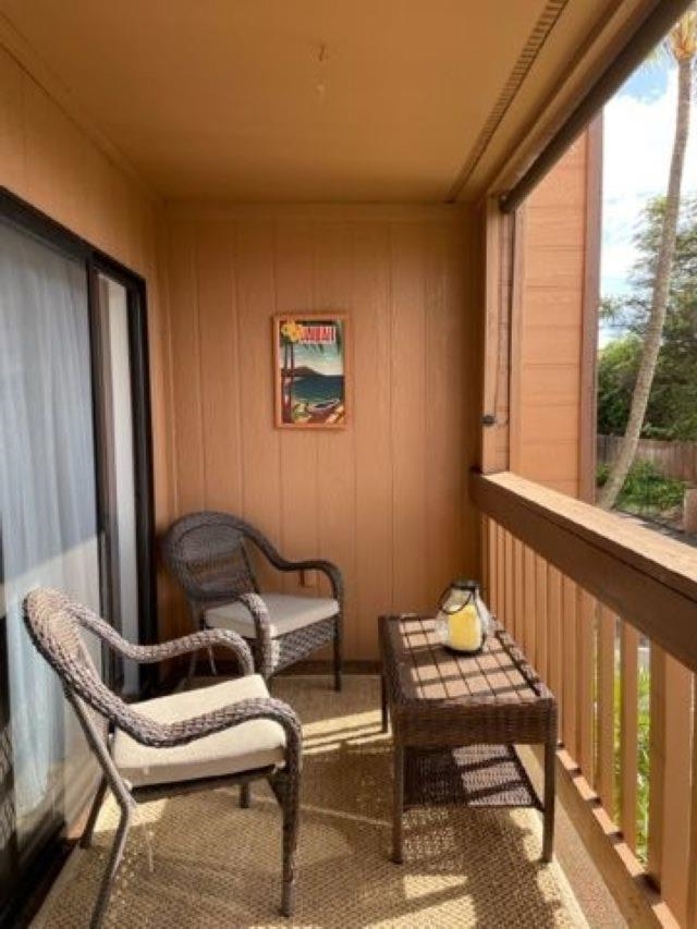 3740 Lower Honoapiilani Road, Unit G205 Lahaina, HI 96761 - Photo 4 of 8 a living room with furniture and a window