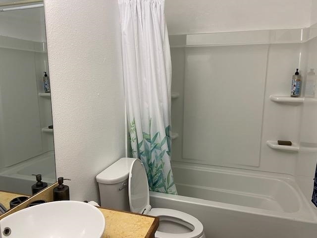 3740 Lower Honoapiilani Road, Unit G205 Lahaina, HI 96761 - Photo 7 of 8 a bath room with a toilet and a bath tub