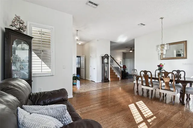 a view of a dining room with furniture window and outside view