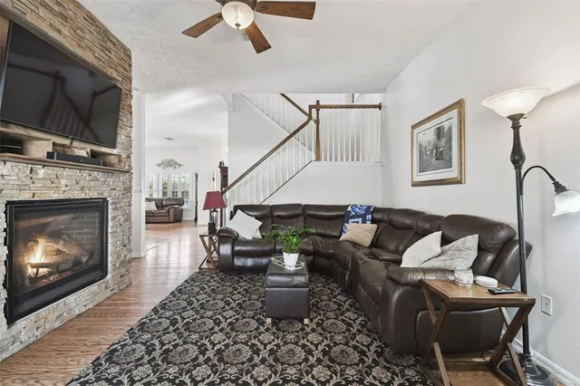 a bedroom with a bed and a chair