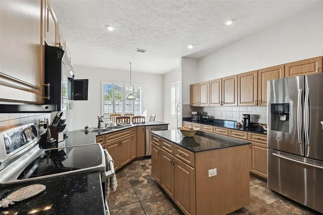 $716,000 | 7904 Portrait Court, New Port Richey, FL 34654