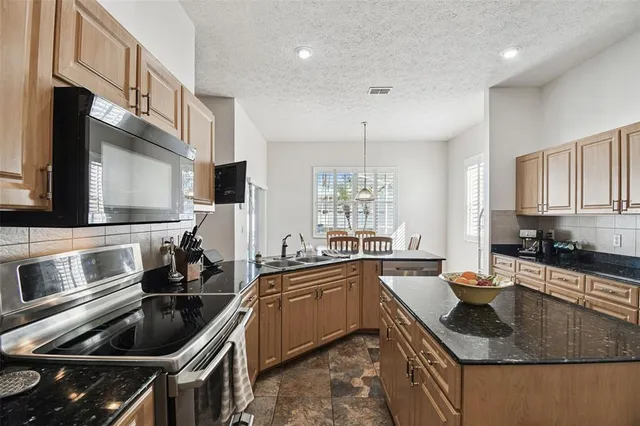 $716,000 | 7904 Portrait Court, New Port Richey, FL 34654