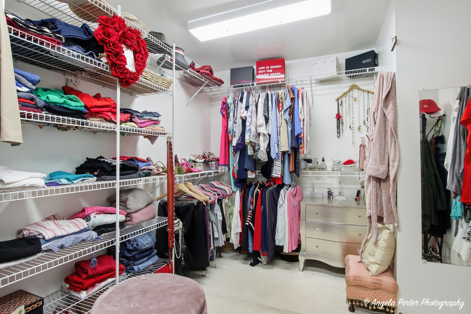 7390 Bittersweet Drive Gurnee, IL 60031 - Photo 17 of 26 a view of walk in closet with clothes