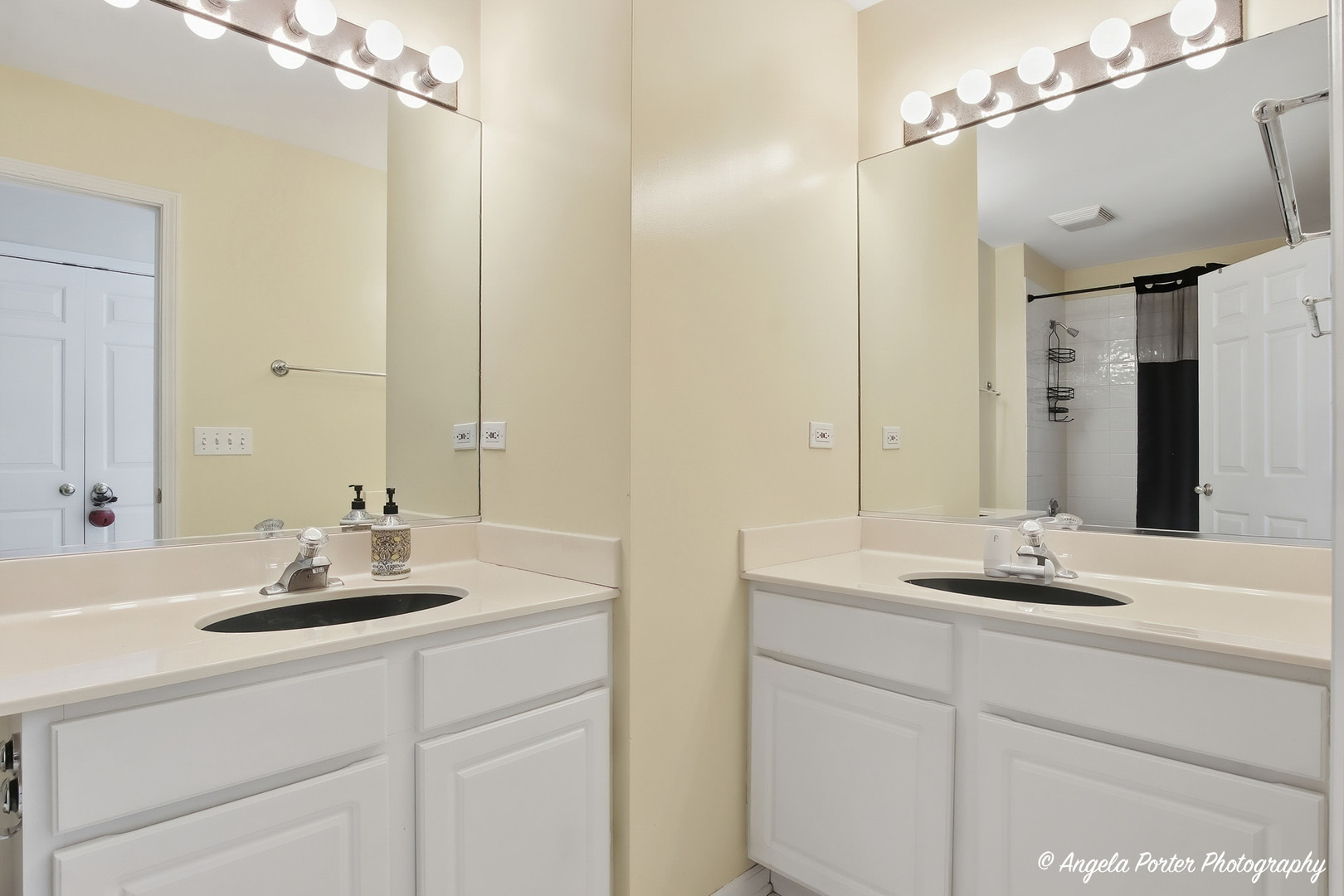 7390 Bittersweet Drive Gurnee, IL 60031 - Photo 23 of 26 a bathroom with a sink and a mirror