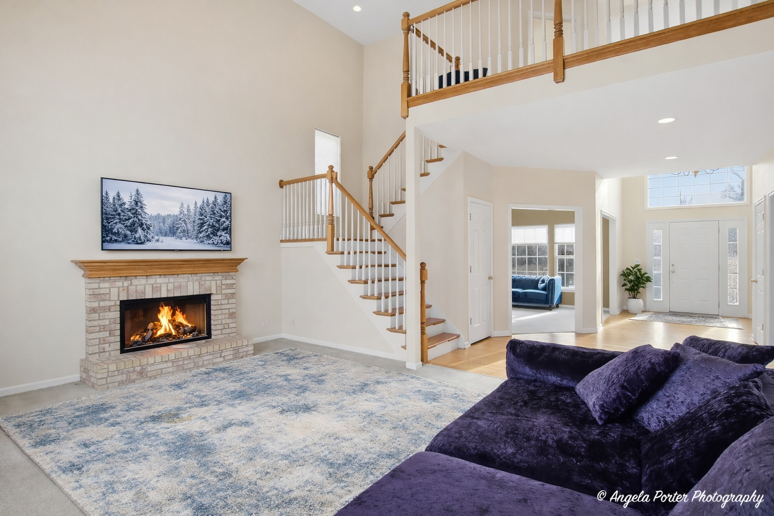 7390 Bittersweet Drive Gurnee, IL 60031 - Photo 4 of 26 a living room with furniture and a fireplace