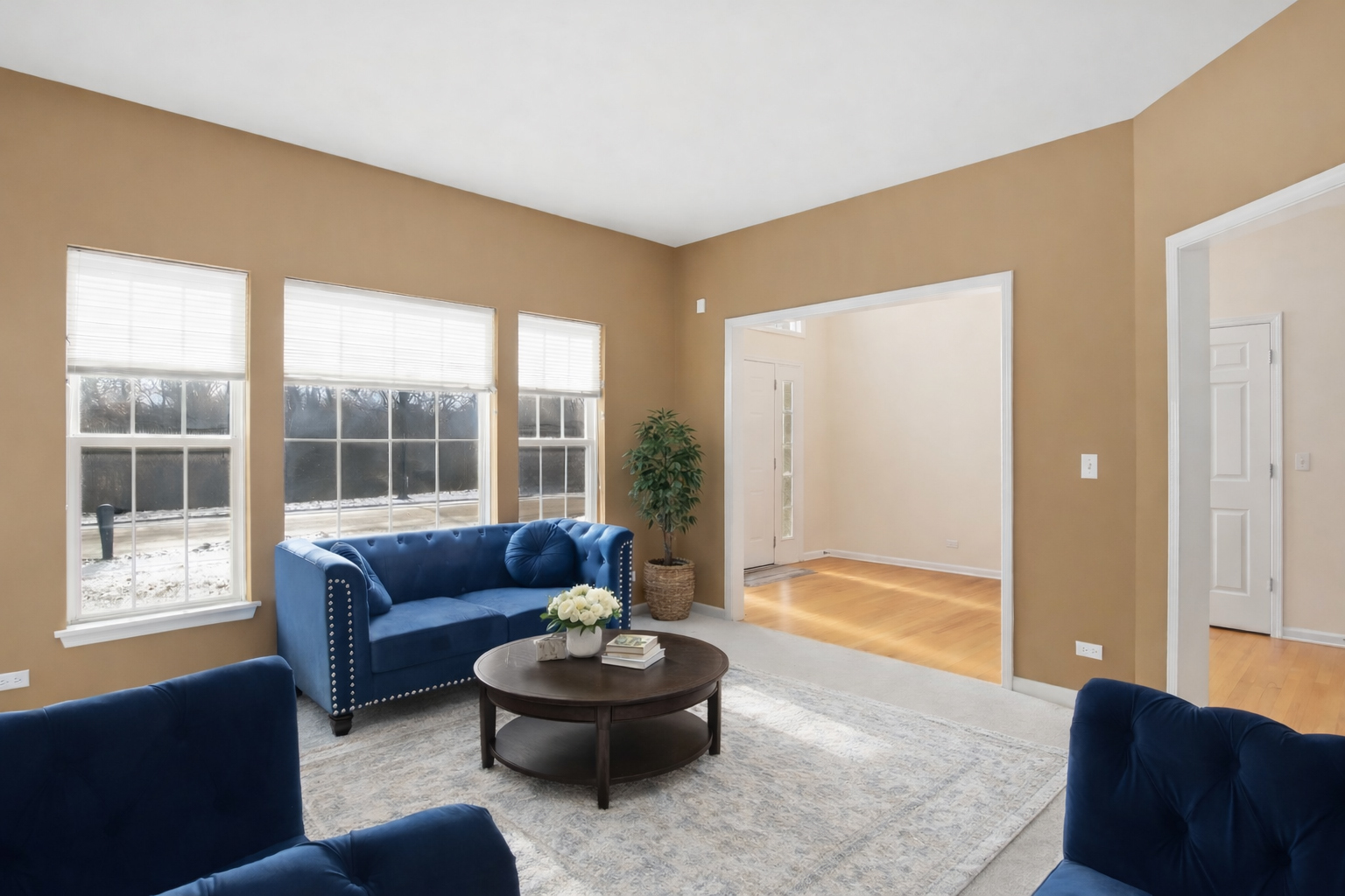 7390 Bittersweet Drive Gurnee, IL 60031 - Photo 7 of 26 a living room with furniture and a large window