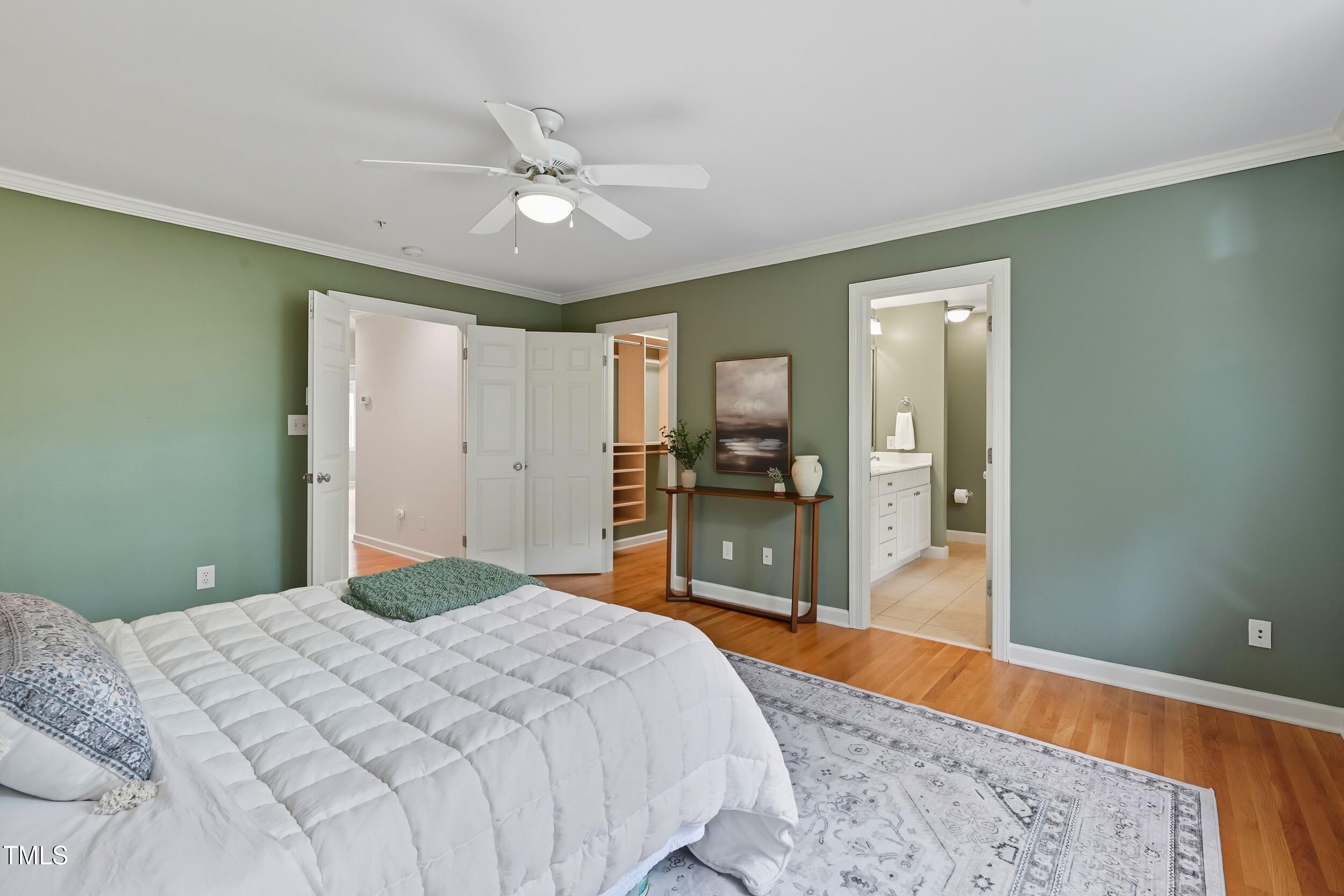 222 Towne Ridge Lane Chapel Hill, NC 27516 - Photo 20 of 39 a bedroom with a bed and a dresser