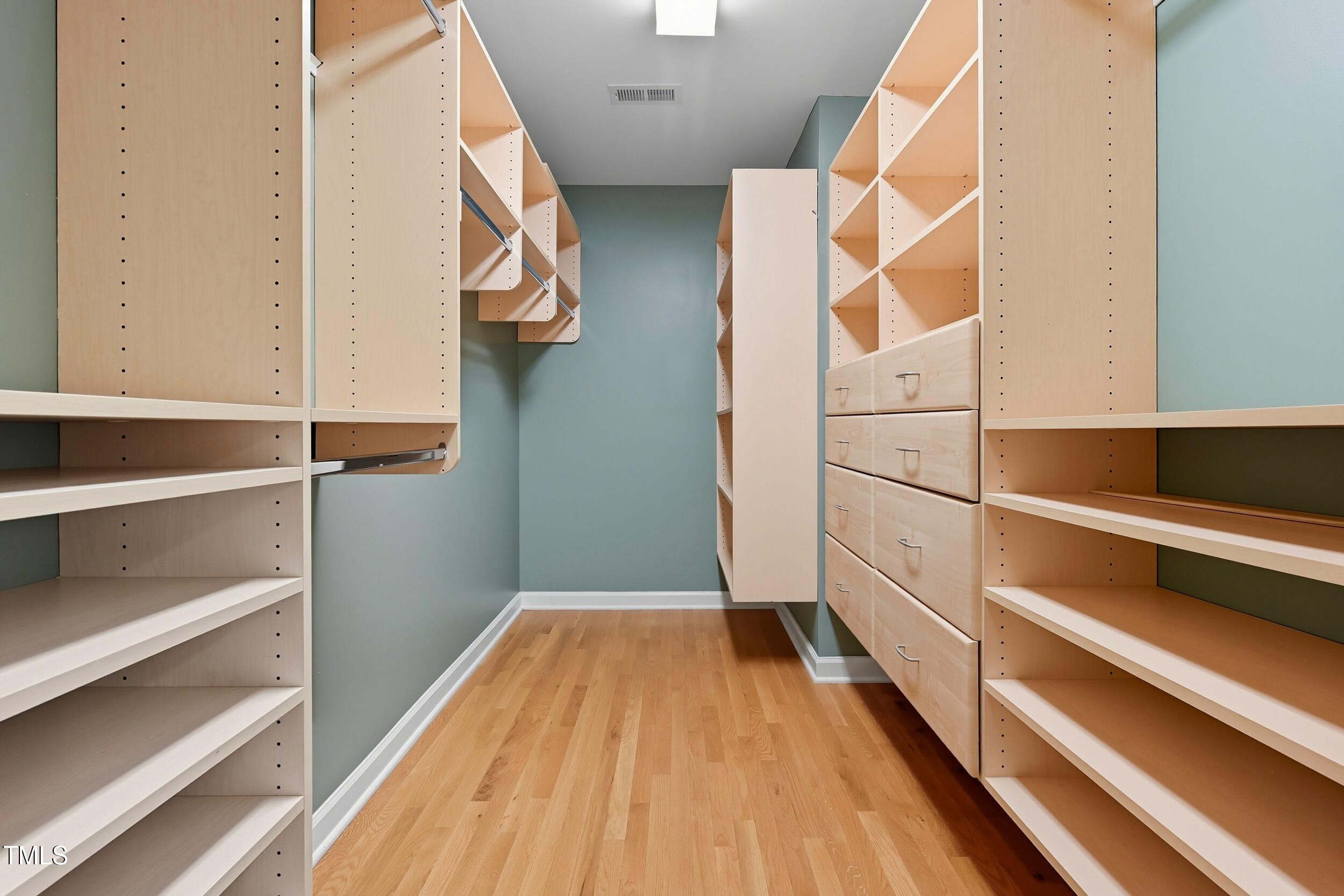 222 Towne Ridge Lane Chapel Hill, NC 27516 - Photo 24 of 39 a view of walk in closet with empty racks
